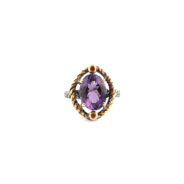 Front view of silver ring with amethyst and red sapphire